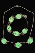 A VINTAGE JADE AND MARCASITE NECKLET AND BRACELET SET, each comprised of round carved jadeite