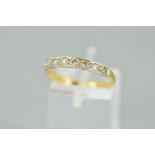 A LATE 20TH CENTURY DIAMOND HALF ETERNITY RING, estimated total diamond weight 0.21ct, ring size