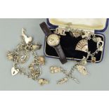 TWO CHARM BRACELETS AND A WATCH WITH ANTIQUE CASE, the charm bracelets on curb link chains