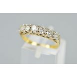 A LATE 20TH CENTURY DIAMOND HALF HOOP RING, six modern round brilliant cut diamonds totalling