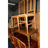 A SET OF SIX OAK ARTS AND CRAFTS RUSH SEATED CHAIRS