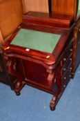 A REPRODUCTION MAHOGANY DAVENPORT with various drawers