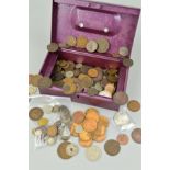 A CASH BOX OF WORLD COINS, to include some silver and some interesting coinage