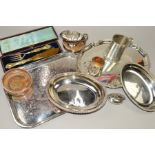 A SMALL QUANTITY OF SILVER PLATE to include an oval entree dish and cover, two trays, a conical mug,
