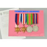 A WWII GROUP OF MEDALS, mounted on card, all named to P/125199 Captain A.B. Jackson, Royal Army