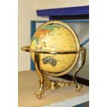 A TABLE TOP TERRESTRIAL GLOBE with hardstone effect inlays to represent the countries, supported