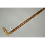 A HORN HANDLED KNOBBLY/WOODEN WALKING CANE, decorative silver plated mount marked 'ATC & LF 1880-