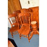 A ROUND DINING ROOM TABLE with four matching chairs (one leaf) (6)