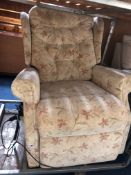 AN ELECTRIC READING CHAIR (situated near lot 1209)