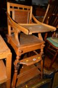 AN EARLY 20TH CENTURY OAK METAMORPHIC HIGH CHAIR