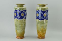 A PAIR OF ROYAL DOULTON STONEWARE VASES, applied floral and beaded decoration, impressed backstamp