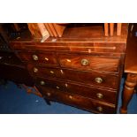 A GEORGIAN FLAME MAHOGANY AND INLAID CHEST of two short and three long drawers on bracket feet,