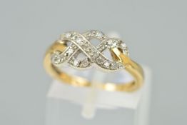 A 9CT GOLD DIAMOND DRESS RING, the interlinking design set with single cut diamonds, with 9ct