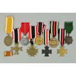 A COLLECTION OF GERMAN WWI/WWII MEDALS AND AWARDS, as follows, a WWI Honour Cross with swords, un-