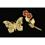 TWO 9CT GOLD BROOCHES, the first designed as a filigree butterfly, the second designed as two roses,