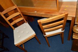 A MODERN PINE TABLE and four chairs (5)