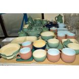 A COLLECTION OF DENBY AND LANGLEY STONEWARE, to include tureens, graduated jugs, serving dishes,