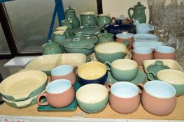 A COLLECTION OF DENBY AND LANGLEY STONEWARE, to include tureens, graduated jugs, serving dishes,