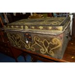 A LATE 19TH/EARLY 20TH CENTURY HIDE LEATHER AND BRASS STUDDED BLANKET CHEST with double iron