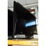 A PANASONIC 37'' FSTV (two remotes), together with a black glass TV stand (4) (situated near lot