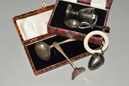 A CASED ELIZABETH II SILVER EGG CUP AND SPOON, engraved initials, makers Walker & Hall, Sheffield