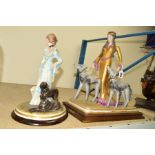 CAPODIMONTE 'ESTER', a female figure in 1920's dress walking a pair of hounds, printed backstamp and
