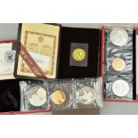 A GOLD 100 DOLLAR PROOF CANADIAN COIN, approximately 16.9655 grams, .917, 27mm, International year