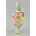 A ROYAL WORCESTER PEDESTAL EWER, shape No 1581, florally decorated with gilt edging, puce