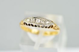 A GOLD EARLY 20TH CENTURY DIAMOND HALF HOOP RING, five old Swiss and eight cut diamonds totalling