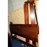 AN OAK 195CM BED FRAME comprising of a headboard, footboard and two side supports with wooden slats