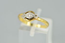 AN EARLY 20TH CENTURY THREE STONE DIAMOND CROSSOVER DESIGN RING, estimated total diamond weight 0.