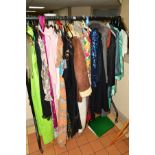 A LARGE SELECTION OF VINTAGE CLOTHES, to include a Jacques Vert three piece outfit, three coats, a