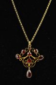 A GARNET FILIGREE SCROLL DESIGN PENDANT, stamped '9ct', together with medium weight close belcher