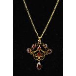 A GARNET FILIGREE SCROLL DESIGN PENDANT, stamped '9ct', together with medium weight close belcher