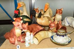 A SELECTION OF NOVELTY DECORATIVE ANIMALS to include ducks, geese and foxes, tallest is