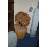 A BEECH OCTAGONAL SHOP DISPLAY CABINET with three circular shelves, approximate diameter 75cm x