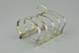 A GEORGE V SILVER FIVE BAR TOAST RACK, of domed form, Sheffield 1934, 1.8 ozt, 58 grams