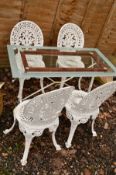 A GLASS TOPPED GARDEN TABLE ON A WHITE PAINTED ALUMINIUM STAND, together with a set of four