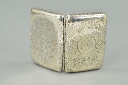 AN EARLY 20TH CENTURY SILVER CIGARETTE CASE, fully engraved in a floral scroll design with a