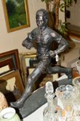 A LARGE FIGURE OF A RUNING MAN, height approximately 60cm