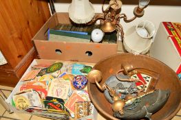 TWO BOXES AND LOOSE SUNDRY ITEMS, to include beer mats, books, light fittings, metalwares, etc