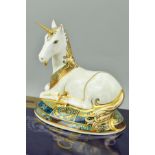 A BOXED LIMITED EDITION ROYAL CROWN DERBY PAPERWEIGHT, 'Unicorn', No.925/2000, to celebrate the