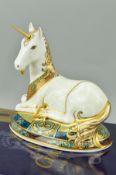 A BOXED LIMITED EDITION ROYAL CROWN DERBY PAPERWEIGHT, 'Unicorn', No.925/2000, to celebrate the