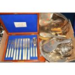 A BOX OF SILVER PLATE INCLUDING AN OVAL TRAY, silver backed dressing table mirror and brush, tea
