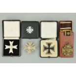 FOUR BOXED HIGHLY SOUGHT AFTER GERMAN MEDALS, as follows, a boxed WWII 3rd Reich Iron Cross 1st