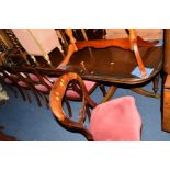 A REPRODUCTION MAHOGANY TWIN PEDESTAL DINING TABLE with an additional leaf, width 162cm x depth