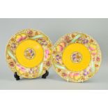 TWO ROYAL WORCESTER CABINET PLATES, fruit decorated with gilt overlay, puce backstamp and No.1734,