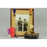 A MONEY TIN CONTAINING THE FOLLOWING MEDALS, etc, 1939-45, Africa Star (1st Army bar) War medal,