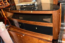 A MODERN BLACK GLASS TOPPED TV STAND with double glazed doors, width 125cm