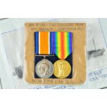 A WWI PAIR OF BRITISH WAR AND VICTORY MEDALS, named to 208945 Arthur E Troke, Able Seaman Royal